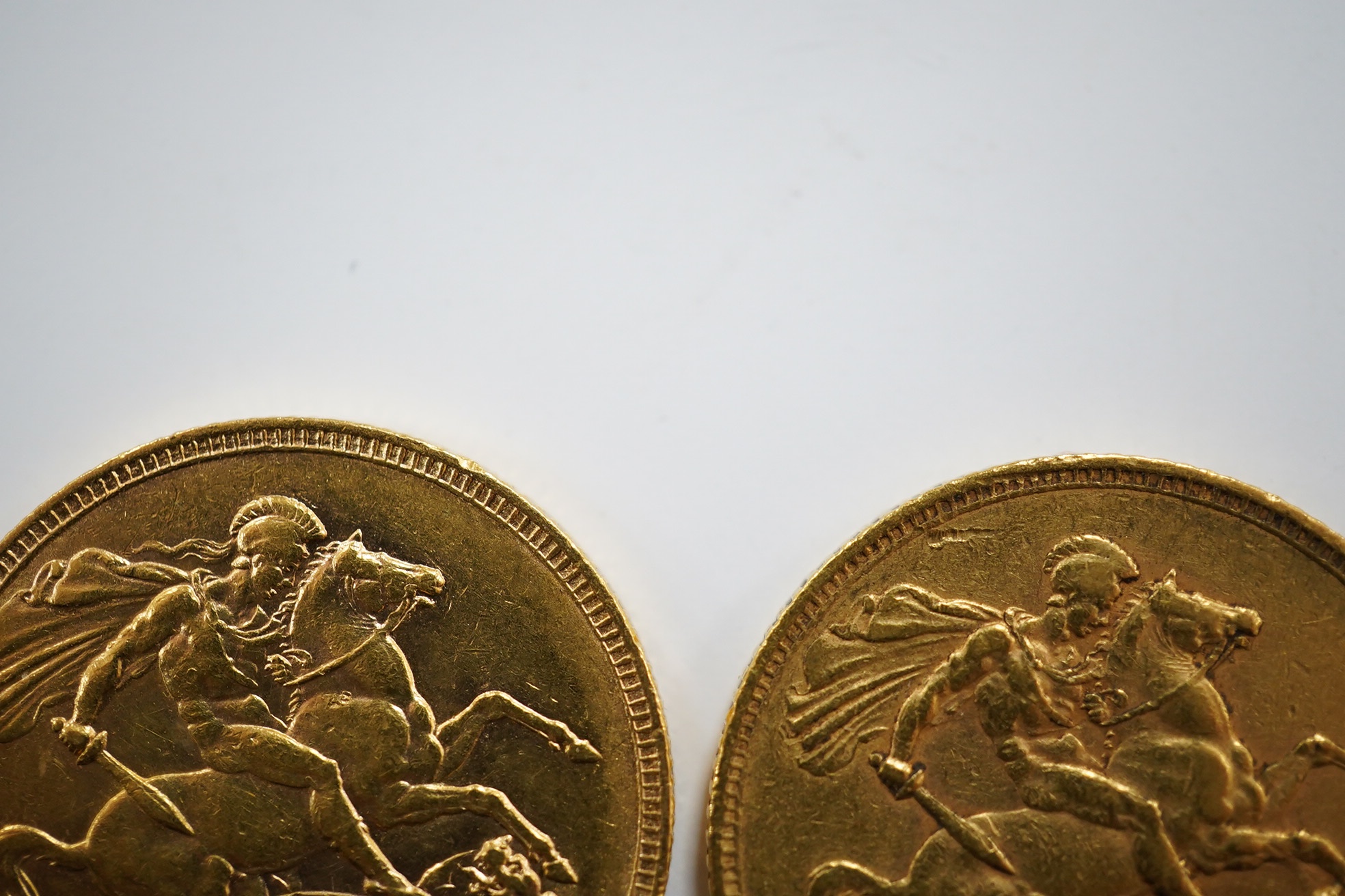 British gold coins, Victoria, two gold sovereigns, 1876, near fine and 1896, fine or better (2)